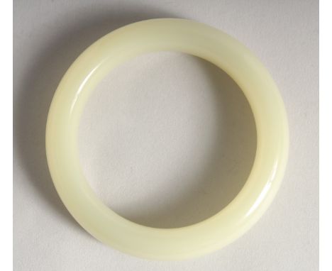 A CHINESE JADE BANGLE.