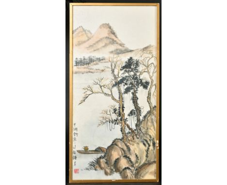 A CHINESE PAINTING OF A LANDSCAPE WITH MOUNTAINS, with calligraphy and red seal, framed and glazed, image 65.5cm x 30cm.