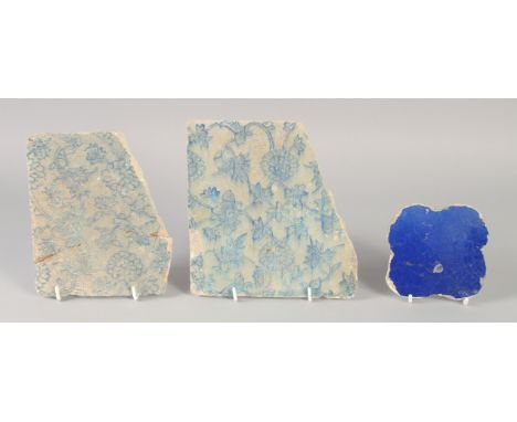 TWO 16TH-17TH CENTURY PERSIAN SAFAVID TILE FRAGMENTS, together with another small Seljuk Kashan tile, Safavid tiles 17.5cm x 