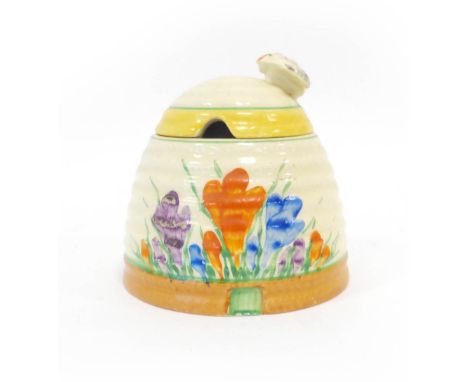 Clarice Cliff for Newport Pottery, a 'Crocus' pattern honeypot and cover, h. 9.5 cm   CONDITION REPORT:  No obvious chips or 