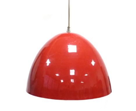 A red enamelled ceiling lamp with a cream interior