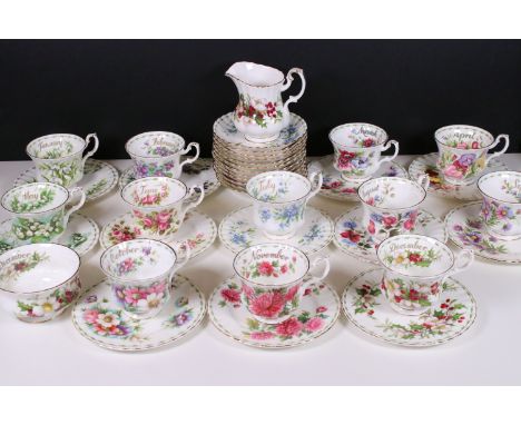 Royal Albert 'Flower of the Month' series trio tea cups, saucers and plates sets, to include all months, milk jug and Decembe