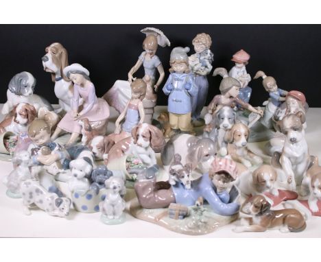 Collection of Lladro and Nao dog related figurines to include 5401, Collectors Society 1989, 7612 5th Anniversary, 7672, 6229