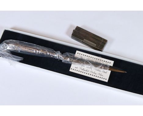A hallmarked sterling silver handled letter opener within fitted gift box together with a white metal Dunhill pocket lighter.