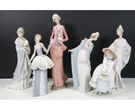 Selection of Lladro figurines to include flapper girl, signed to base, 5789, girl with watering can 6876, girl with ruffled d