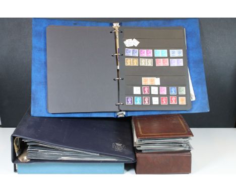 Collection of Great British stamps to include two Stanley Gibbons albums housing mostly unused Queen Elizabeth II stamps, fou