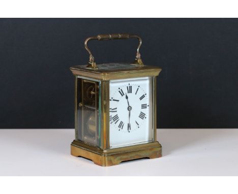 French brass cased carriage clock, early 20th century, 2.5 inch white enamelled dial with Roman numerals and blued steel hand