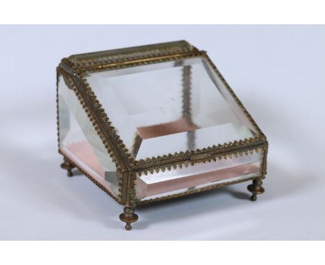 An early 20th century trinket casket box with beveled glass panels. 
