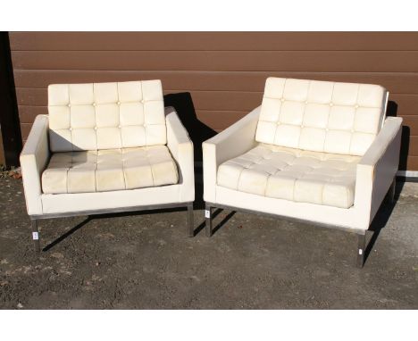 Pair of Robin Day 1960's button detail  lounge chairs on frame legs 