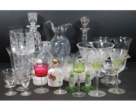 Selection of glass pieces to include footed glass jug, glass ladle, footed glass bowl, six etched glass plates, pair of Queen