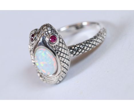 Silver snake ring with large opal to the body 