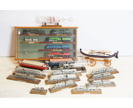 12 Metal locomotive models on wooden plinths to include The Rocket, Duchess of Hamilton etc plus 5 x Collectable Locomotive M