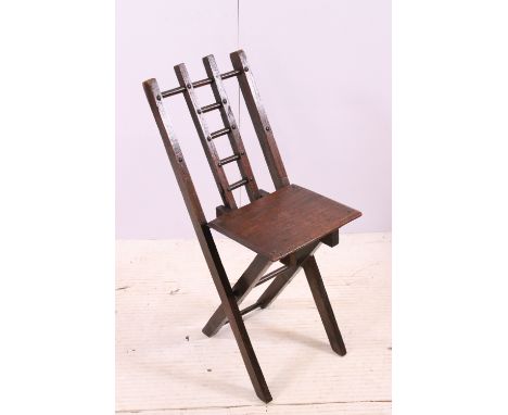 Early 20th century oak folding child's chair with ladder back, H 60cm