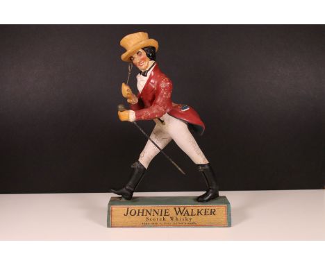 Johnnie Walker 'Scotch Whisky' vintage advertising figure on wooden stand, H 39cm