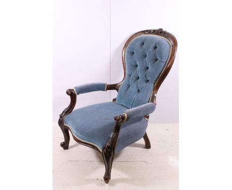20th century mahogany blue button back arm chair on carved cabriole legs 