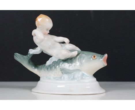 Herend Hungary 'Boy riding a fish' figurine, W 14cm