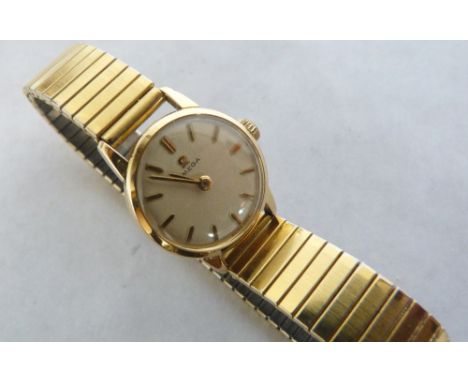 An Omega gold plated lady's wristwatch, calibre 620 movement number 19710703. Original crown. Movement runs. 20mm diam over c