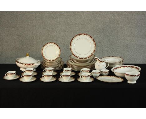 A Royal Doulton 'Winthrop' pattern part dinner/tea service to include, plates, cups and saucers and lidded tureens. H.14 W.32
