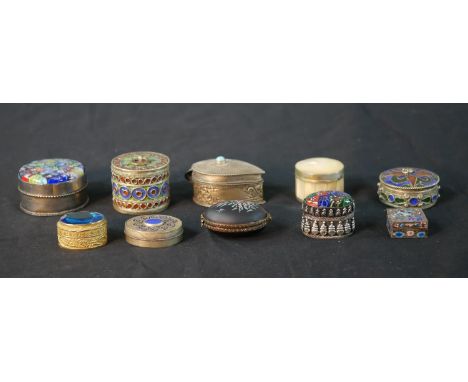 Ten Oriental pill and trinket boxes, one silver and enamel with floral design. H.3.5 W.4.5cm (largest) 