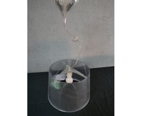 Ferruccio Laviani for Kartell, a Gè pendant lamp, transparent polycarbonate with a pleated style cylindrical shade. H.84 W.34