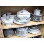 A Limoges part combination service with silvered decoration, monogrammed 'P', seventy-five pieces