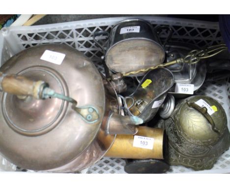 A collection of metalware, including teapots, a shell case, a nutcracker, formed as a dog, etc