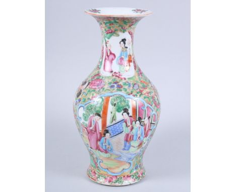 A Canton enamel vase with figure decorated panels and flared rim, 9" high Condition:A small top rim chip, minor losses to ena