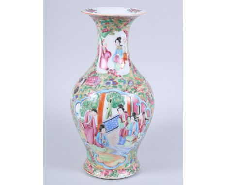 A Canton enamel vase with figure decorated panels and flared rim, 9" high Condition:A small top rim chip, minor losses to ena