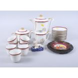 A Limoges crimson and gilt decorated part coffee set, a Vienna porcelain dish in copper mount, and a