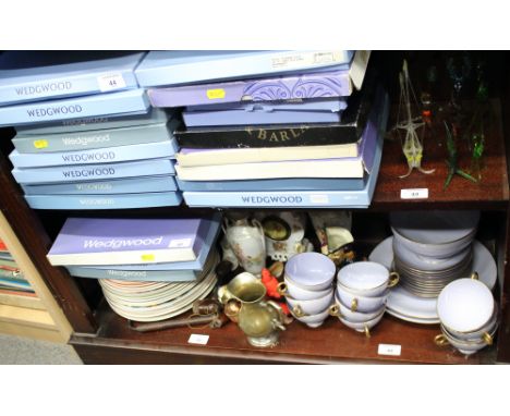 A quantity of mostly Wedgwood calendar plates, a Long John Silver character jug, glass model animals, a purple glazed Brownfi