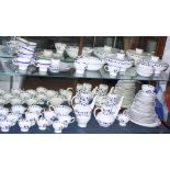 A 1960s Midwinter "Pierrot" pattern part combination service, designed by Nigel Wilde, sixty-five