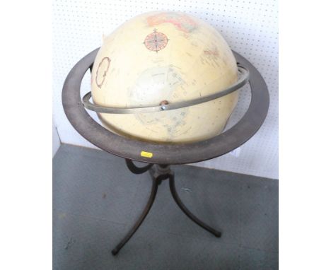 A terrestrial globe, on wrought iron stand with three splayed supports