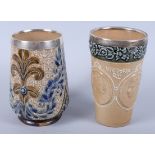 A Doulton Lambeth stoneware beaker, decorated two cameos of Queen Victoria with applied silver