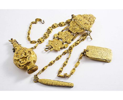 A LATE 18TH CENTURY GILT-METAL CHATELAINE  with chased, linked panels, four chains and the following items dependant; a scent