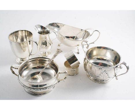 A MIXED LOT:- A two-handled cup with cut-card work, by Walker & Hall, Sheffield 1937, a two-handled cup, initialled, and a sp