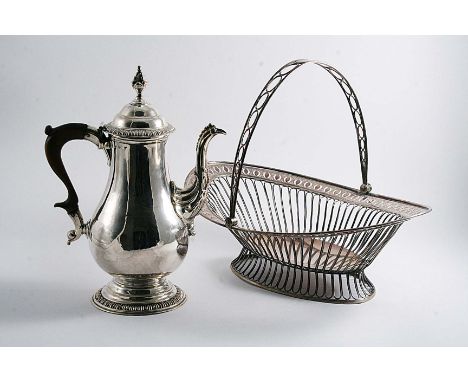 AN EARLY PERIOD SHEFFIELD PLATED COFFEE POT of baluster form with gadrooned borders & a bud finial, crested, (twice), with ps