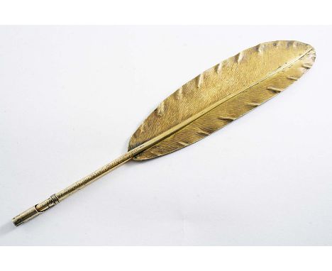 A VICTORIAN SCHOOL LITERARY PRIZE in the form of a silvergilt, quill dip-pen with a clamp and locking ring to hold a nib, ins