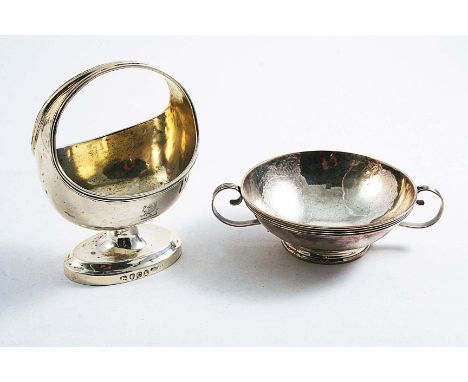 A GEORGE III BASKET-SHAPED SALT  on an oval pedestal foot, crested, gilt interior, by Thomas Wallis, London 1798 and a small 