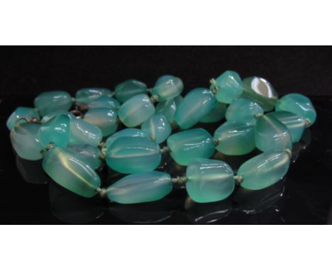 A graduated jade bead necklace, 63cm long