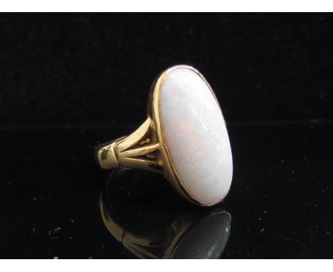 A gold ring with opal (worn) unmarked and resized. Size P/Q, 5.9g