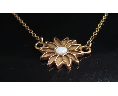 A 9ct gold flower with opal centre on gold chain, 42cm long, 4.5g