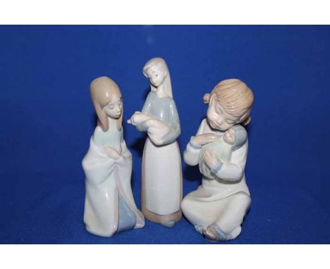 LOT OF LLADRO AND NAO CHILDREN FIGURESincluding several girls in pyjamas, a girl on the telephone with a Dalmatian and a boxe