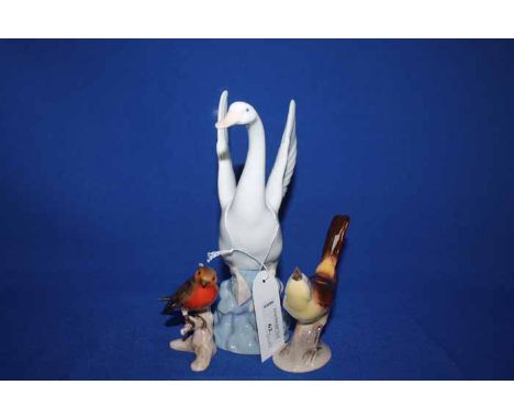 LOT OF CERAMIC FIGURESincluding Nao duck and geese figures, bisque porcelain bird figures, a greyhound figure, etc