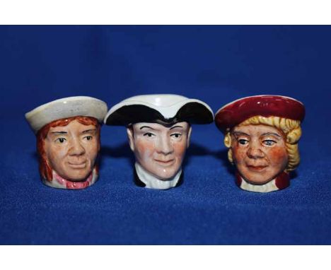 LOT OF TONY WOOD OF STAFFORDSHIRE MINIATURE CHARACTER JUGStogether with a ceramic figure modelled as a parrot, signed A. Poli