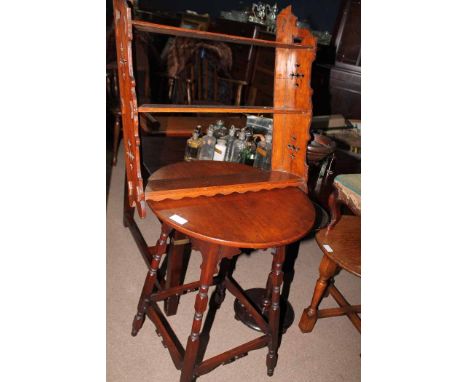 FIVE SMALL PIECES OF FURNITUREincluding a carved mahogany footstool, a mahogany occasional table, an oak ocassional table, a 