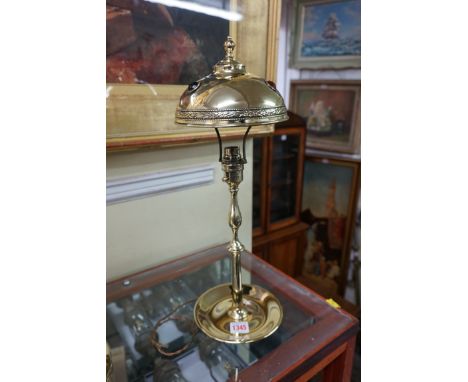 A brass table lamp,&nbsp;with faceted glass bead mounts to the shade, 47cm high.&nbsp; 