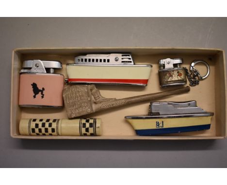 Tobacciana:&nbsp;a Sarome 'Cruiser' lighter; a similar Sankei 'B+I Line' lighter; a clay pipe; and others. (6) 