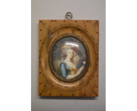 A half-length portrait miniature of a French lady,&nbsp;45 x 3.7cm, in a simulated tortoiseshell frame. 