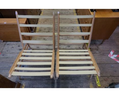 A scarce pair of vintage Ercol 427 lounge chairs. 