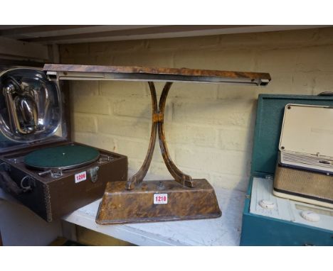 A vintage faux painted desk lamp, inscribed and labelled 'Claude Lumiere', 49cm wide. 